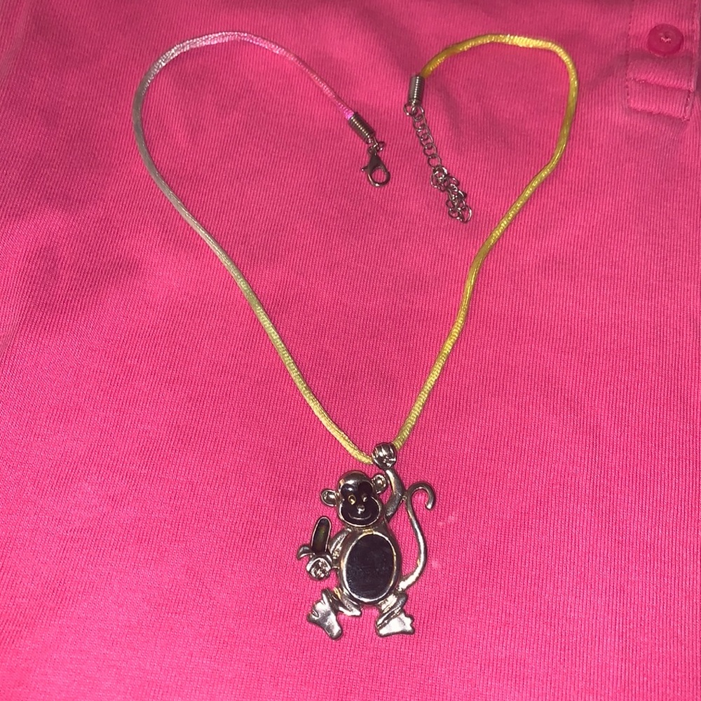 Black and silver monkey necklace
